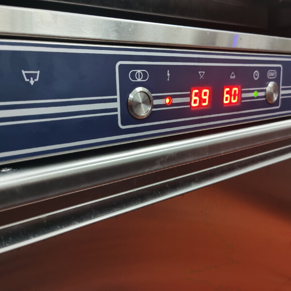 V-TAI Undercounter Dishwasher - Simple Digital Controls & Temperature Monitoring Close-up of V-TAI undercounter dishwasher control panel with power button, start button, indicator lights, and temperature displays for spray and rinse.